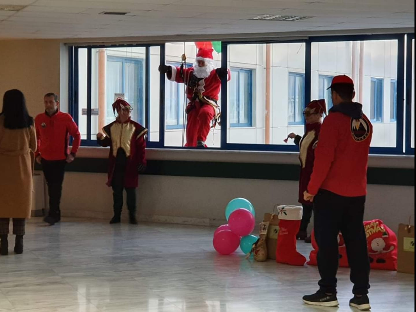 Santa Claus arrives through window at hospital paediatric clinic!